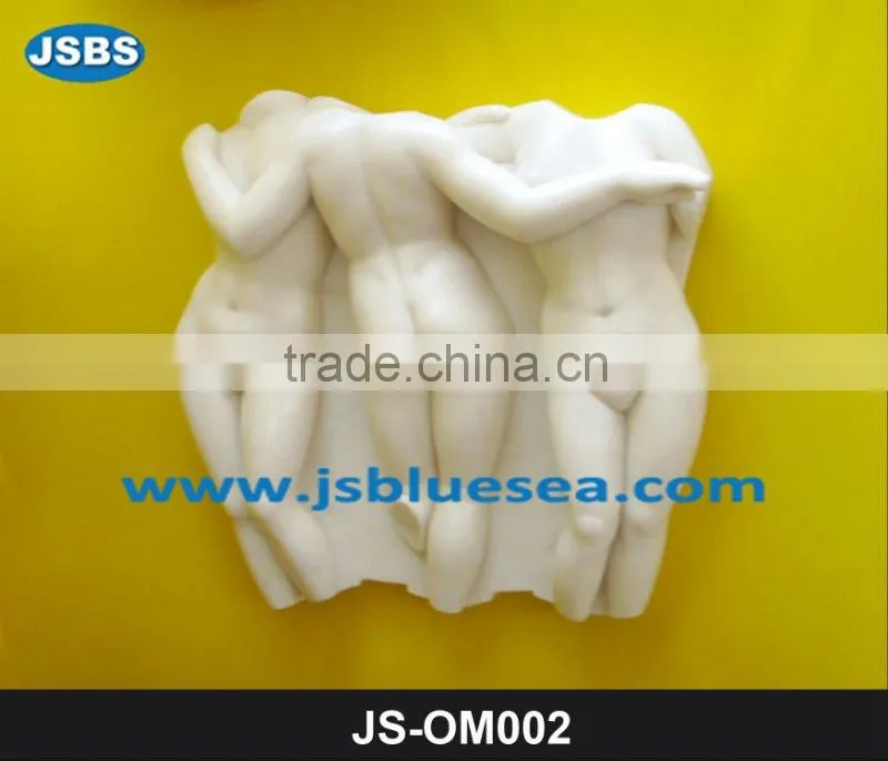 Polished marble nude lady statue in wall