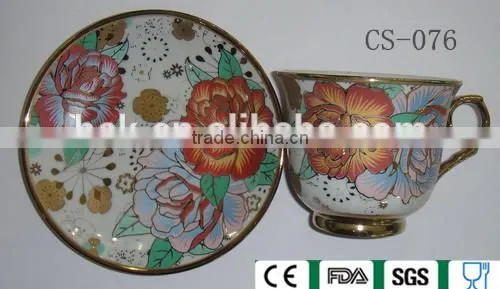Porcelain , full decal , cup/saucer set