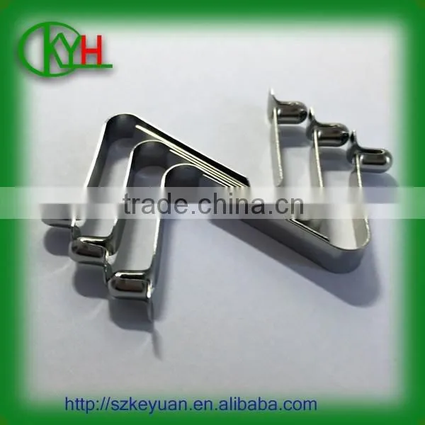 Spring steel nickel plated V shape push button