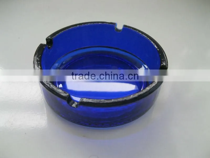dark blue glass ashtray