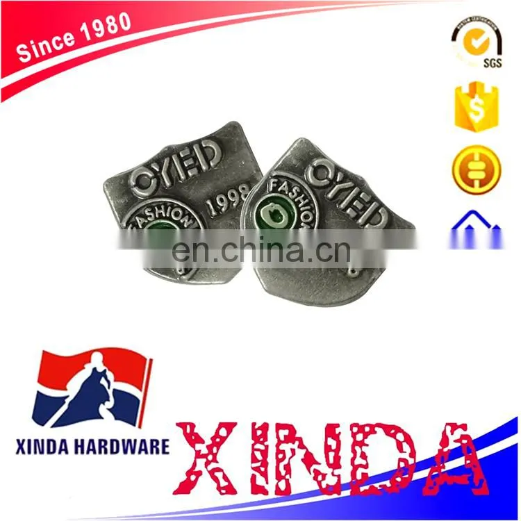 coppery metal badges, metal badge/logo