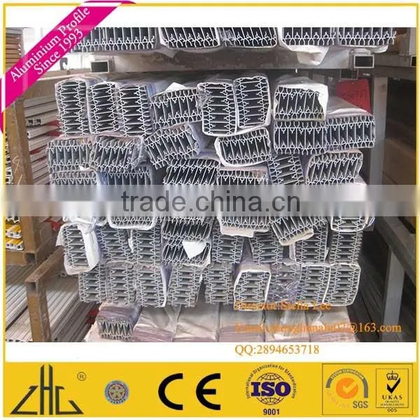 Wood Color Anodizing Polishing Aluminium Extrusion for sliding wardrobe door all types of 6063 anodized dies aluminium extrusion