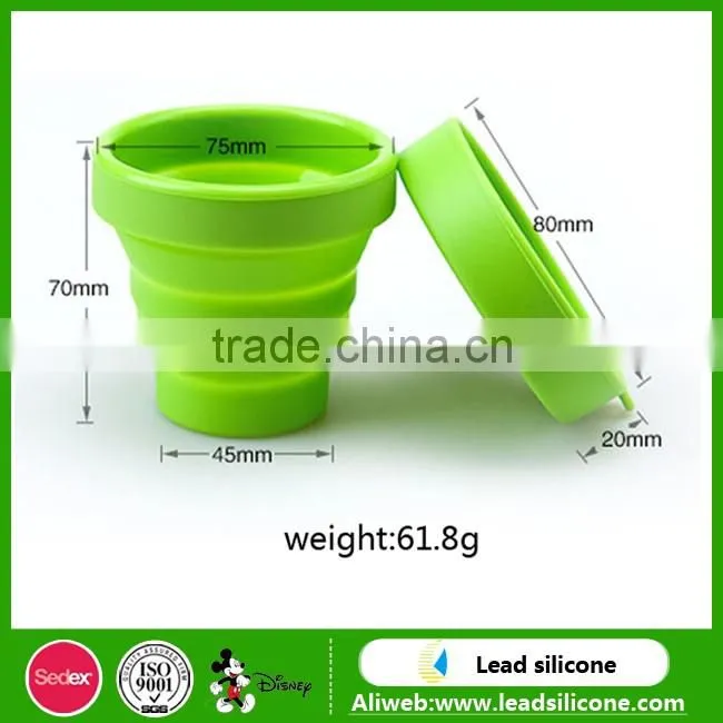 Heat resistant collapsible double wall glass cup with silicone lid