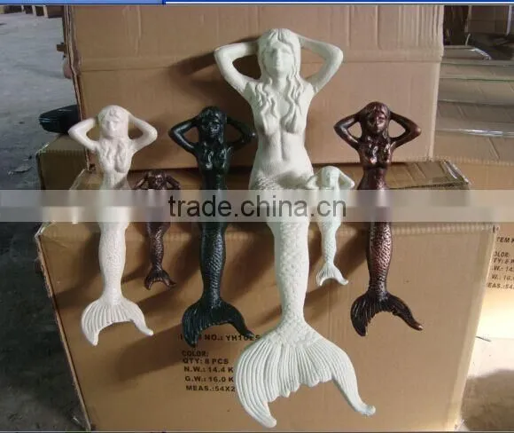 Cast iron mermaid statue