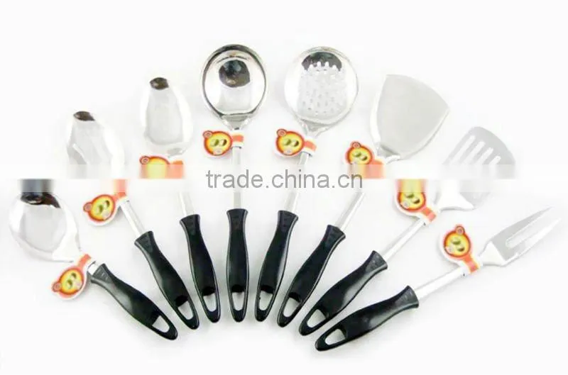 eight pieces of stainless steel kitchen tools with bakelite handle