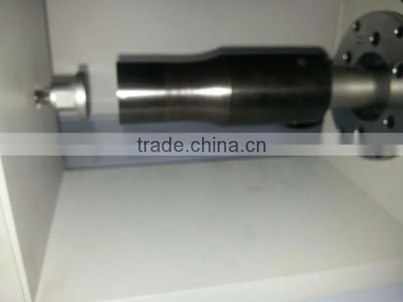Ultrasonic mineral insulated (MI) jacket cable end stripper machine