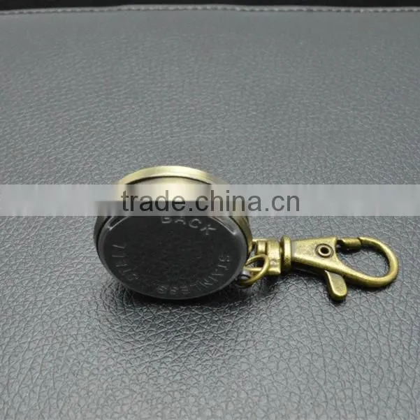 Sun god pocked watch with key chain