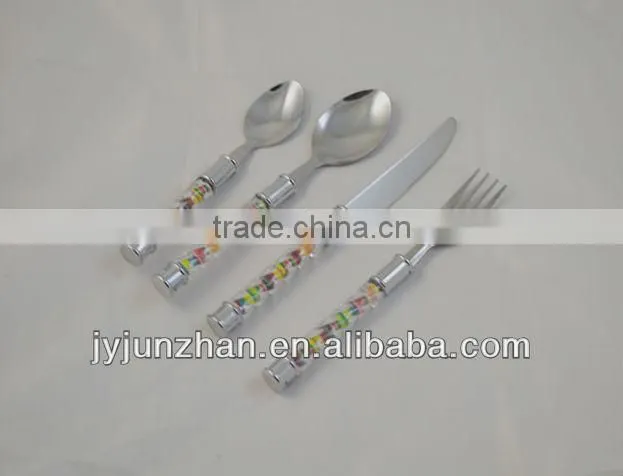 24pcs cutlery sets in plastic basket packing with plastic handle of nice design and OEM quality