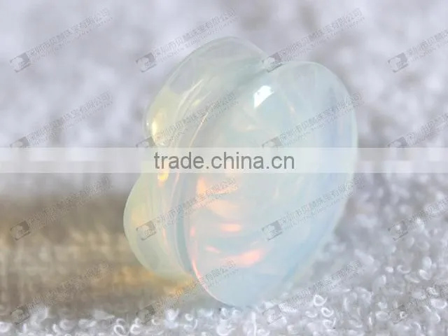 Carved flower gemstone ear plugs