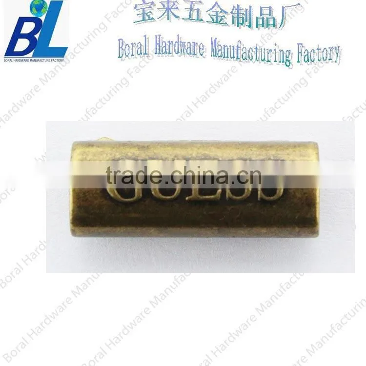 Gold-plating embossed metal zipper puller in zinc alloy