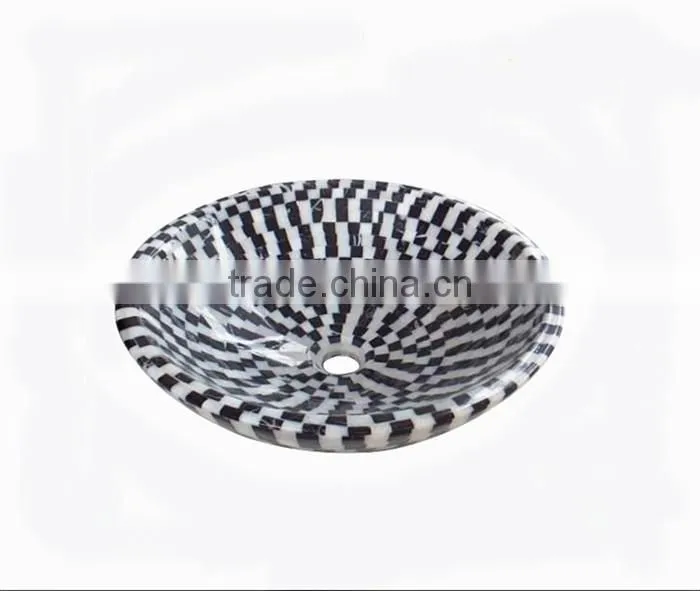 Polished black and white marble mosaic sink