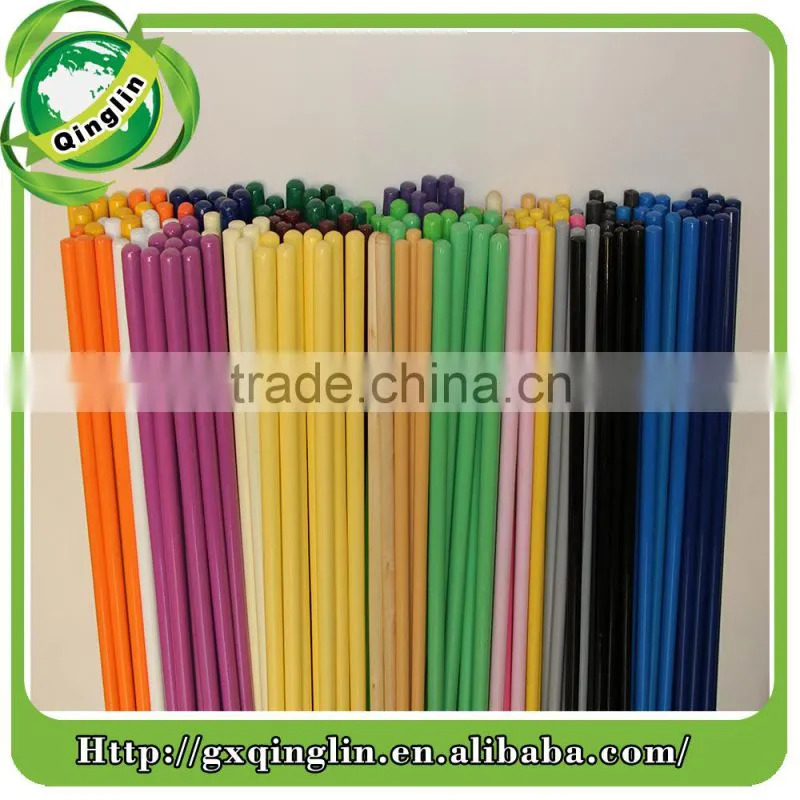 painted wooden poles with long plastic cap and greece thread pine wood