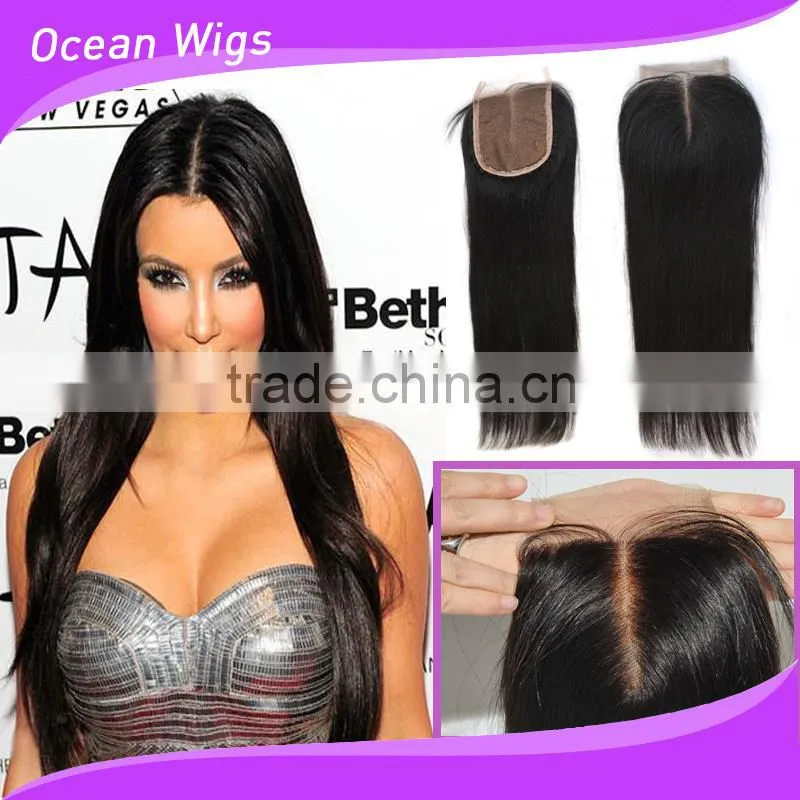 black color top closure with lignt brown lace base