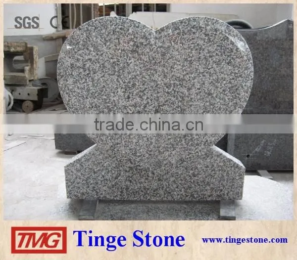 Grey granite monument carved heart designs