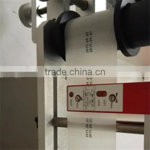 cosmetic oil bottle labeling machine,colored label labeling machine,perfume bottle labeling machine