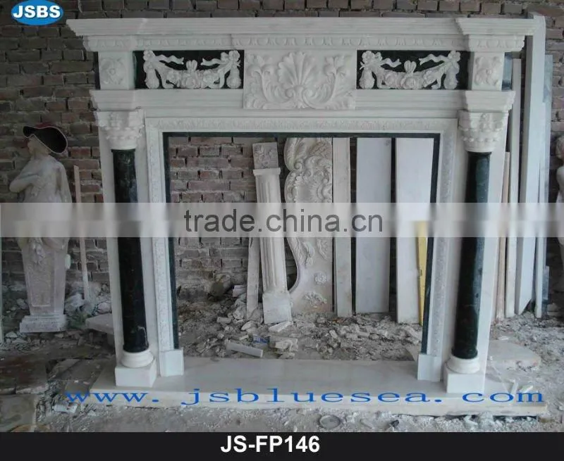 Stone carving of white fireplace mantel