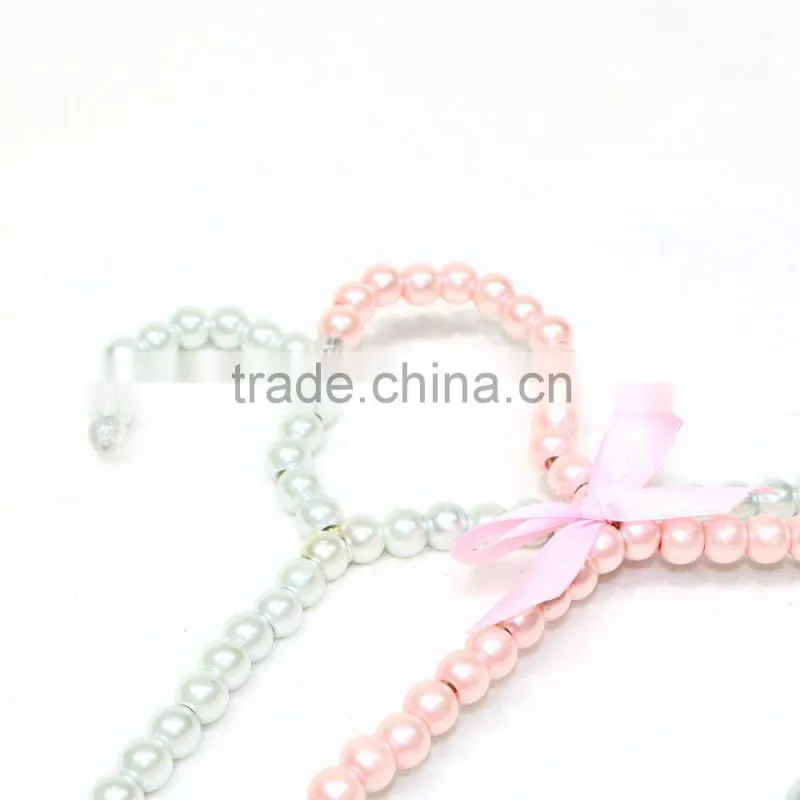 New design cheap brass pearl clothes hanger