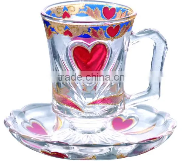 Glass coffee cups and saucers