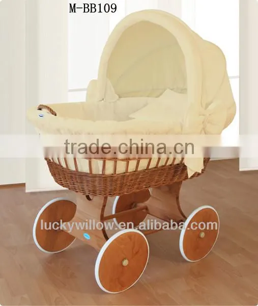 handmade wicker doll pram baby sleeping with handles