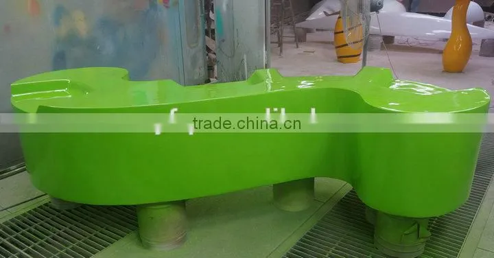 Big green fiberglass leisure chair