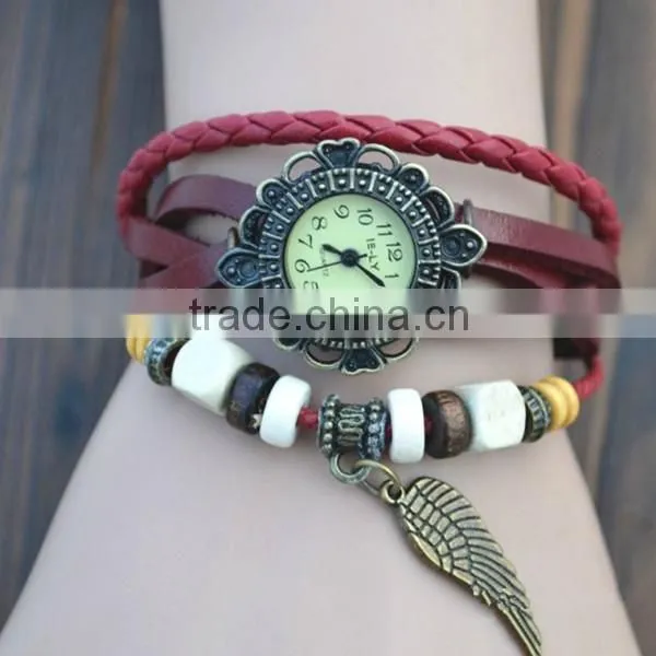 alibaba express Quartz watch F-05 for girls with Wing pendant,leather strap, bronzed watch case