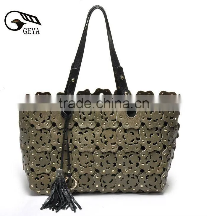 2012 fashion leather handbag ladies bag with punch flower patterns!