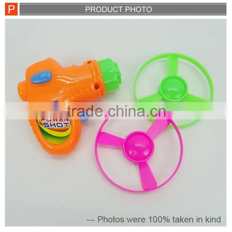 2IN1 Flying disc spinning top gun for kids