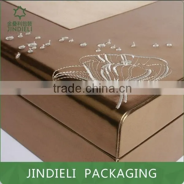 Embroidery design brown cosmetic box packaging