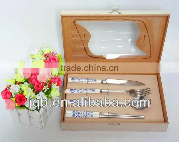 Porcelain handle gift cutlery set with elegant wooden box