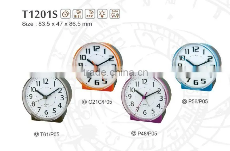 Snooze & Light button on the bottom Alarm clocks