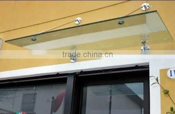 glass canopy with stainless steel support