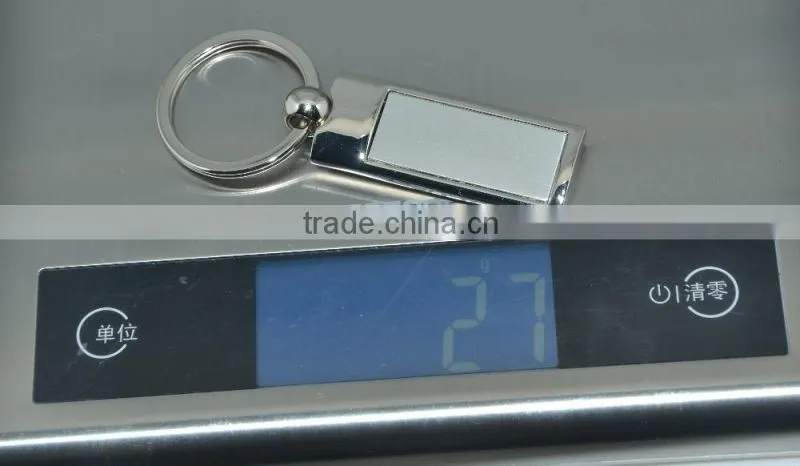 Metal die cut keychains with embossed logo