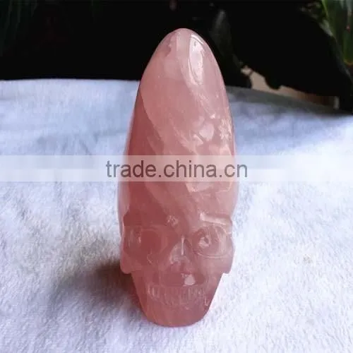 natural rock carved rose quartz crystal skull