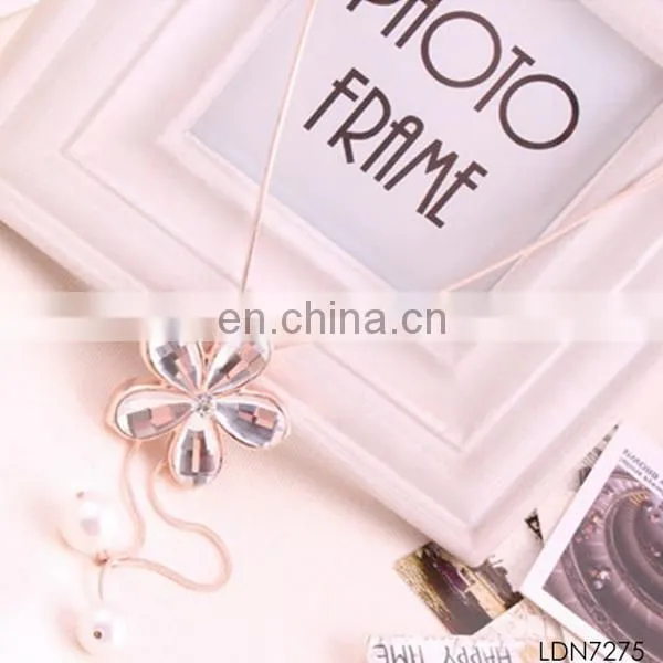 Champagne flower pendant pearl tassel necklace