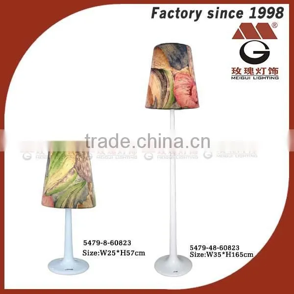 gold metal standing lamp