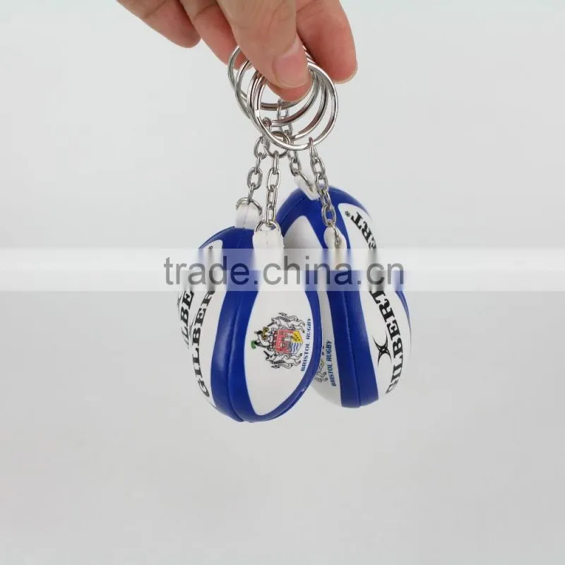 Promotion cheap cute rugby ball keychain,2016 promotional pu mini rugby ball stress ball keychain