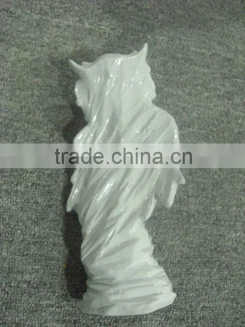 white porcelain wall hanging owl