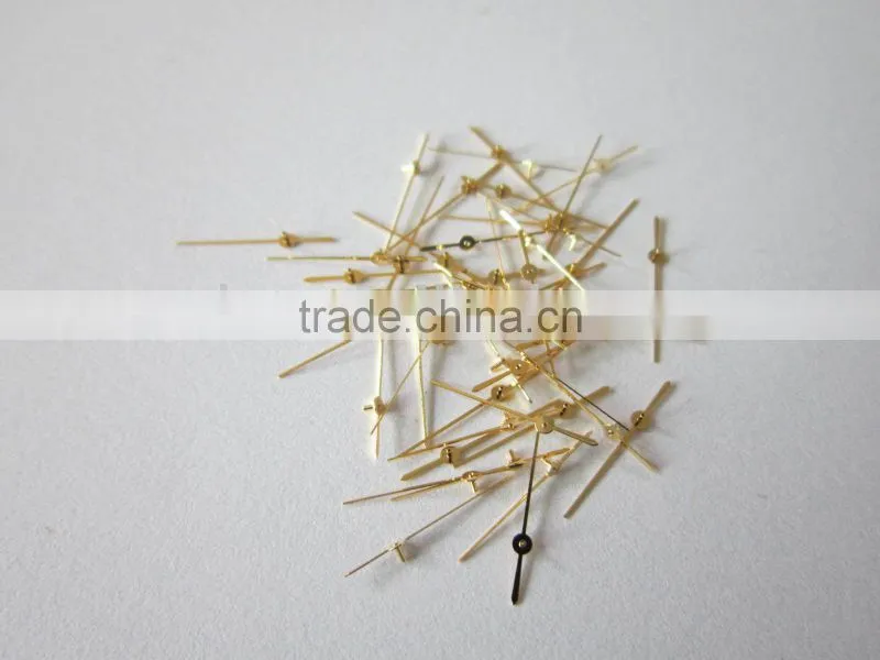 gold diamond cut watch hands with luminous