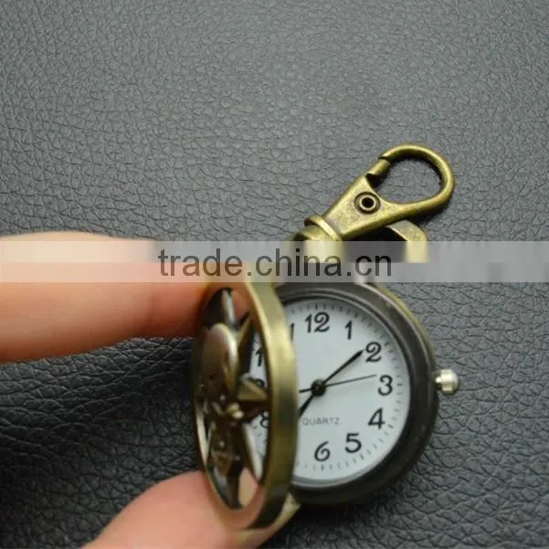 Sun god pocked watch with key chain