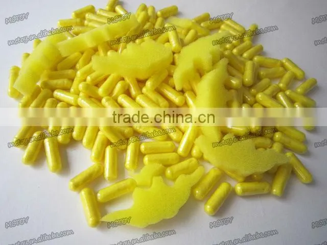 A variety of colors Factory supplier Growing dinosaur capsule Christmas joke funny toys 12pcs/blister card 0.7*2.3cm