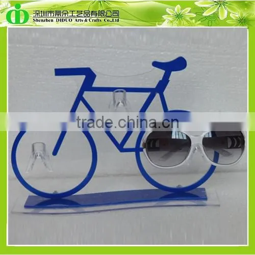 DDU-0010 ISO9001 Chinese Factory Produce Bicycle Shaped Acrylic Sunglasses Display