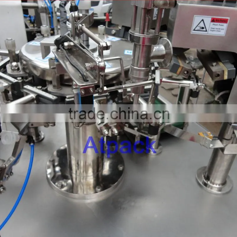 Hand sanitizer pre-made pouch filling and sealing machine