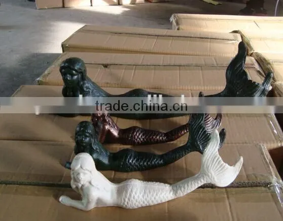 Cast iron mermaid statue