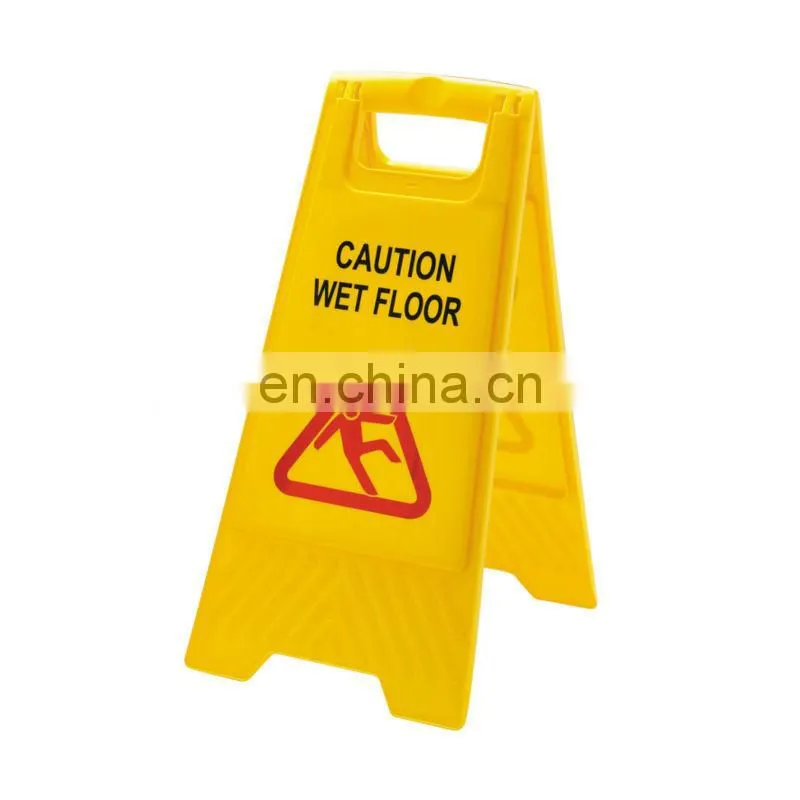 yellow warning sign used in wet floor