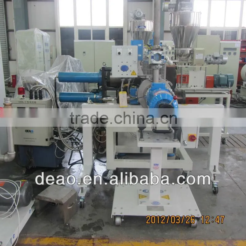 Dual column extruder screen changer