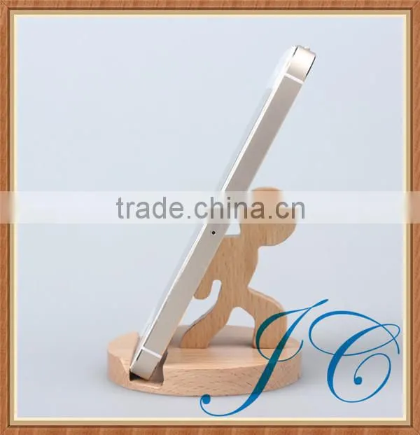Man modeling wooden cell phone holder & mobile phone ring holder