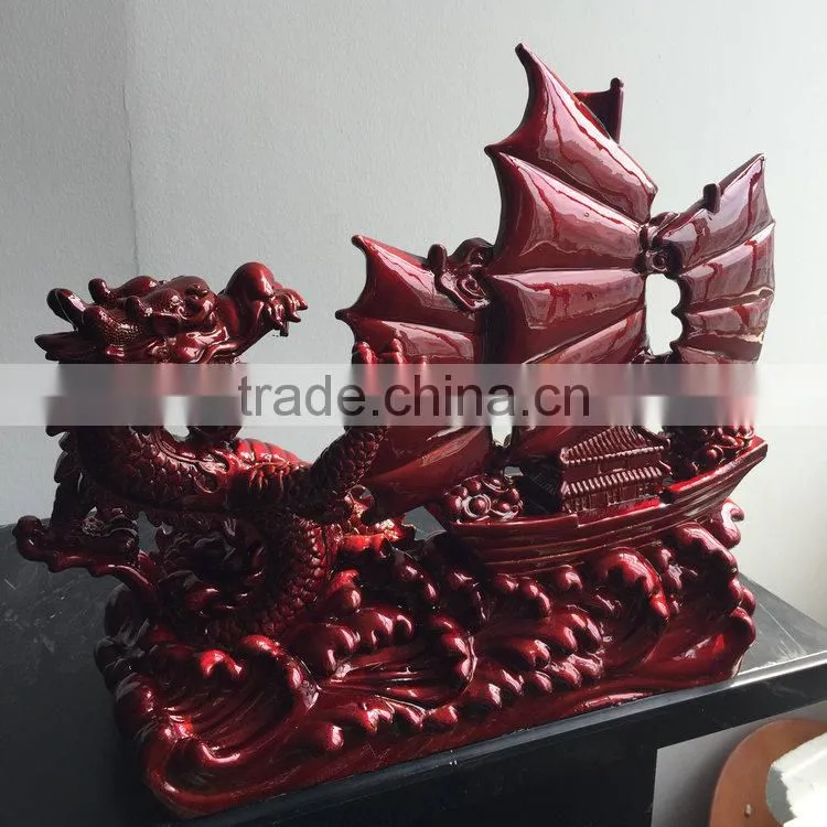 Resin sailing boat sculpture
