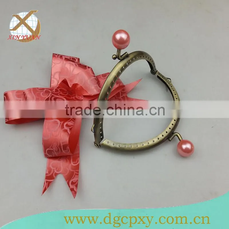 purse metal frame with various color gems