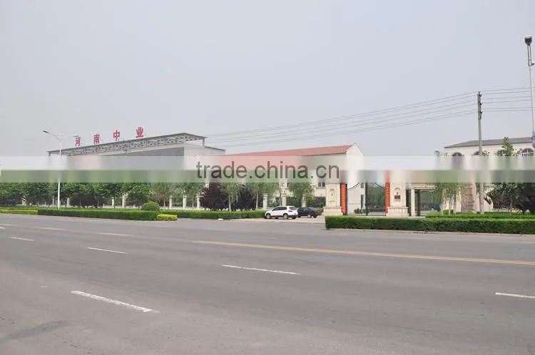 Heat resistant material conveyor trough idler roller