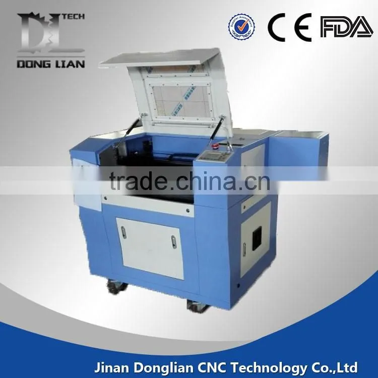 cheap beautiful design jinan Donglian laser cutting and engraving machine price for coconut shell